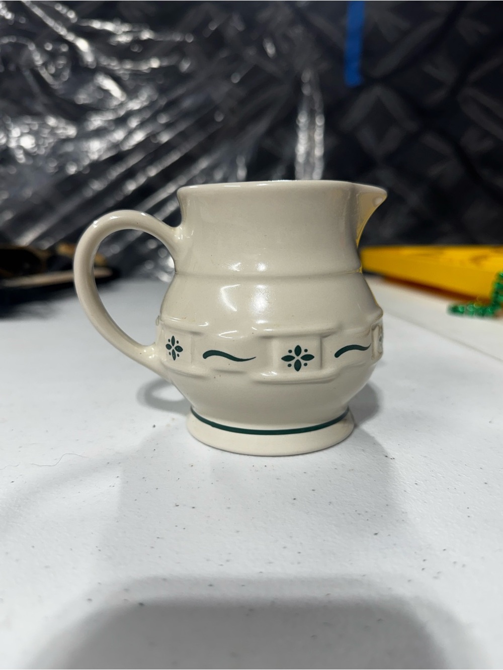 Longaberger Cream Ceramic Pitcher with Green Floral Trim